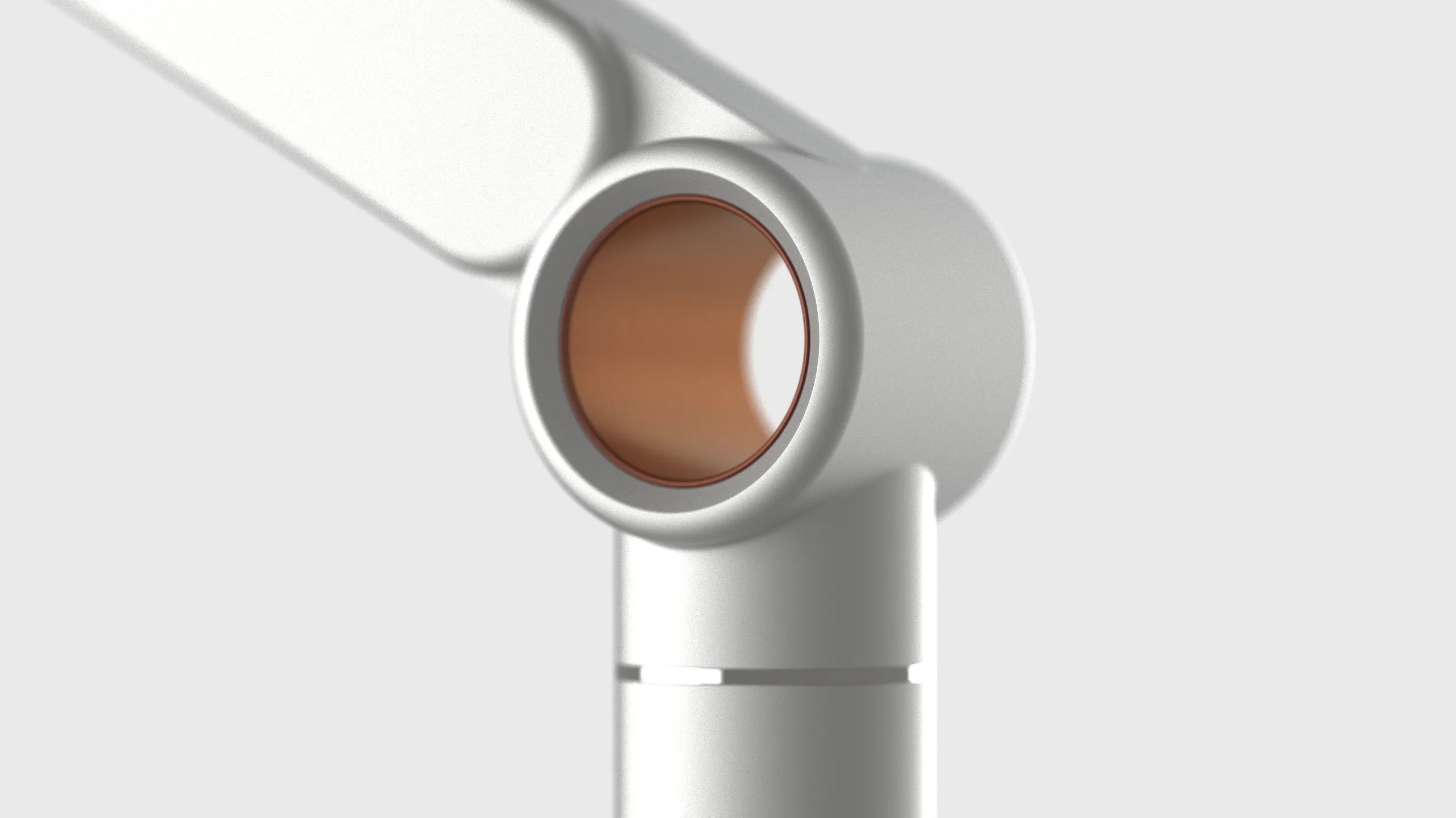 Elbow joint — hollow ring housing with reddish anodized accent